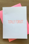 A white minimalist card with the word “totally forgot…”