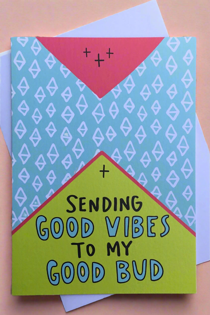 A bright colored greeting card with geometric pattern and text that reads ‘Sending good vibes to my good bud’.