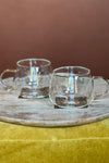 Double walled, insulated glass tea cups.