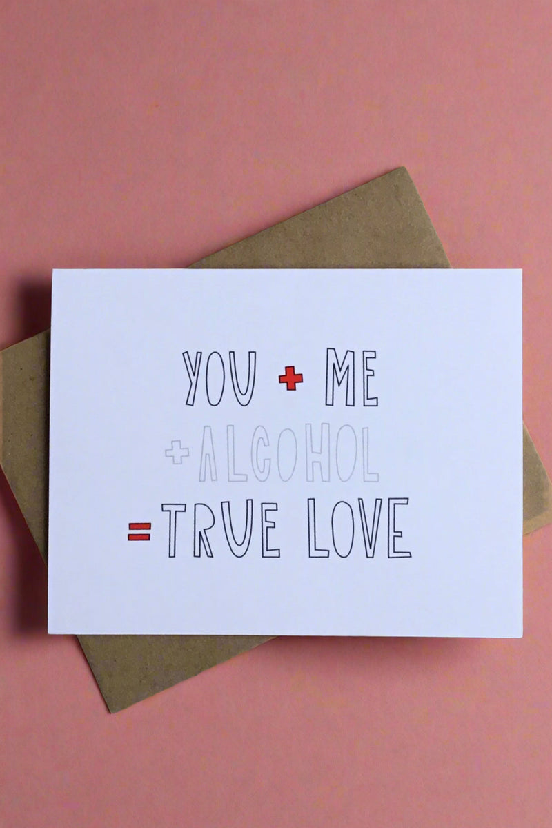 A white minimalist card with the words “You + Me + Alcohol = True Love“ 