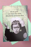 A greeting card with a black and white image of a serious-faced child with glasses on and black text that reads ‘oh.my.god… you have the most absolutely awesome face’.