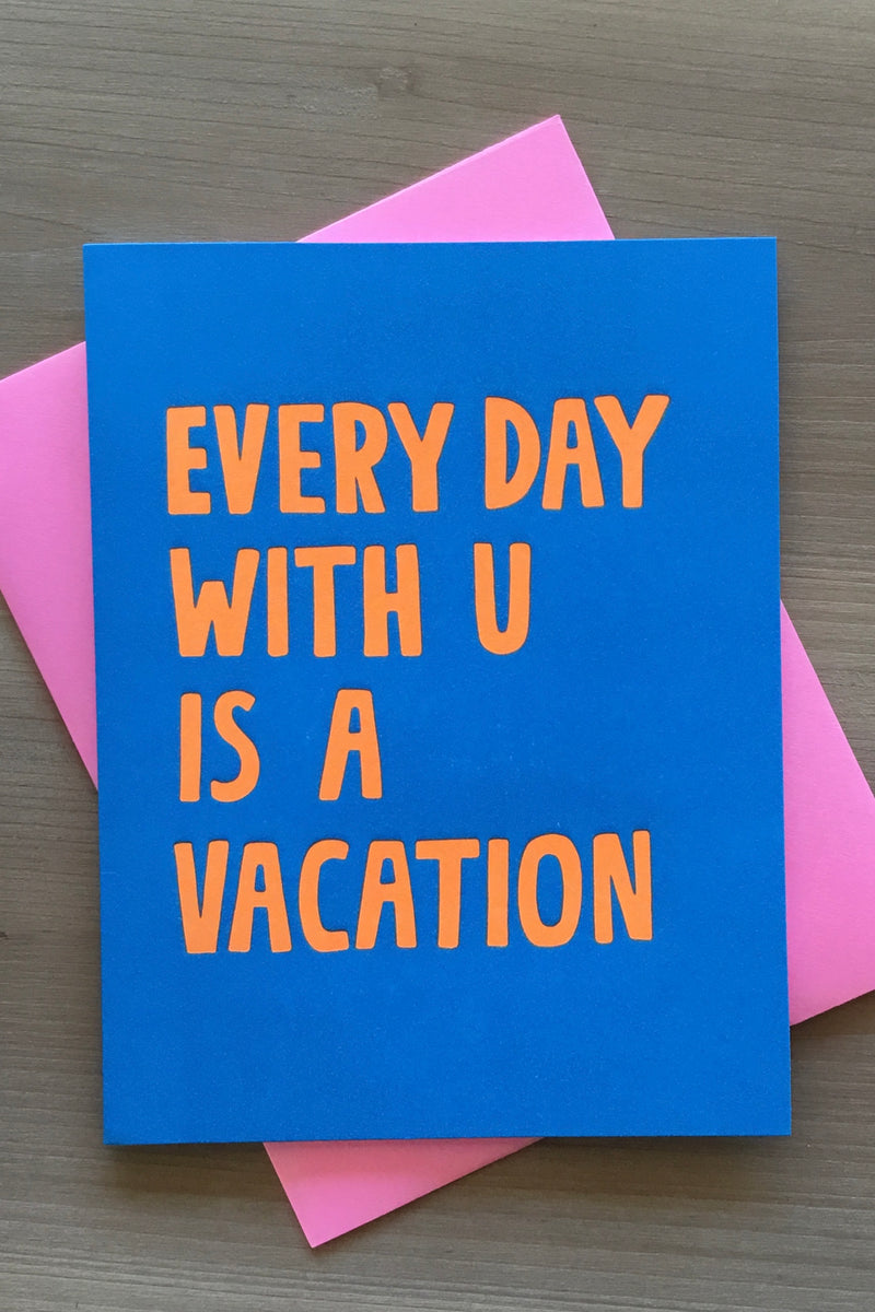 A blue card that’s says “every day with u is a vacation.”