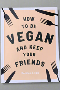 The cover of How To Be Vegan And Keep Your Friends: Recipes & Tips by Annie Nichols.