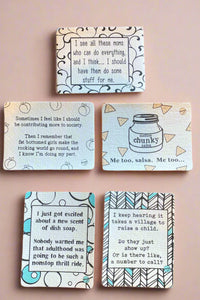 A photo of 5 different reusable cleaning cloths with funny sayings on them.