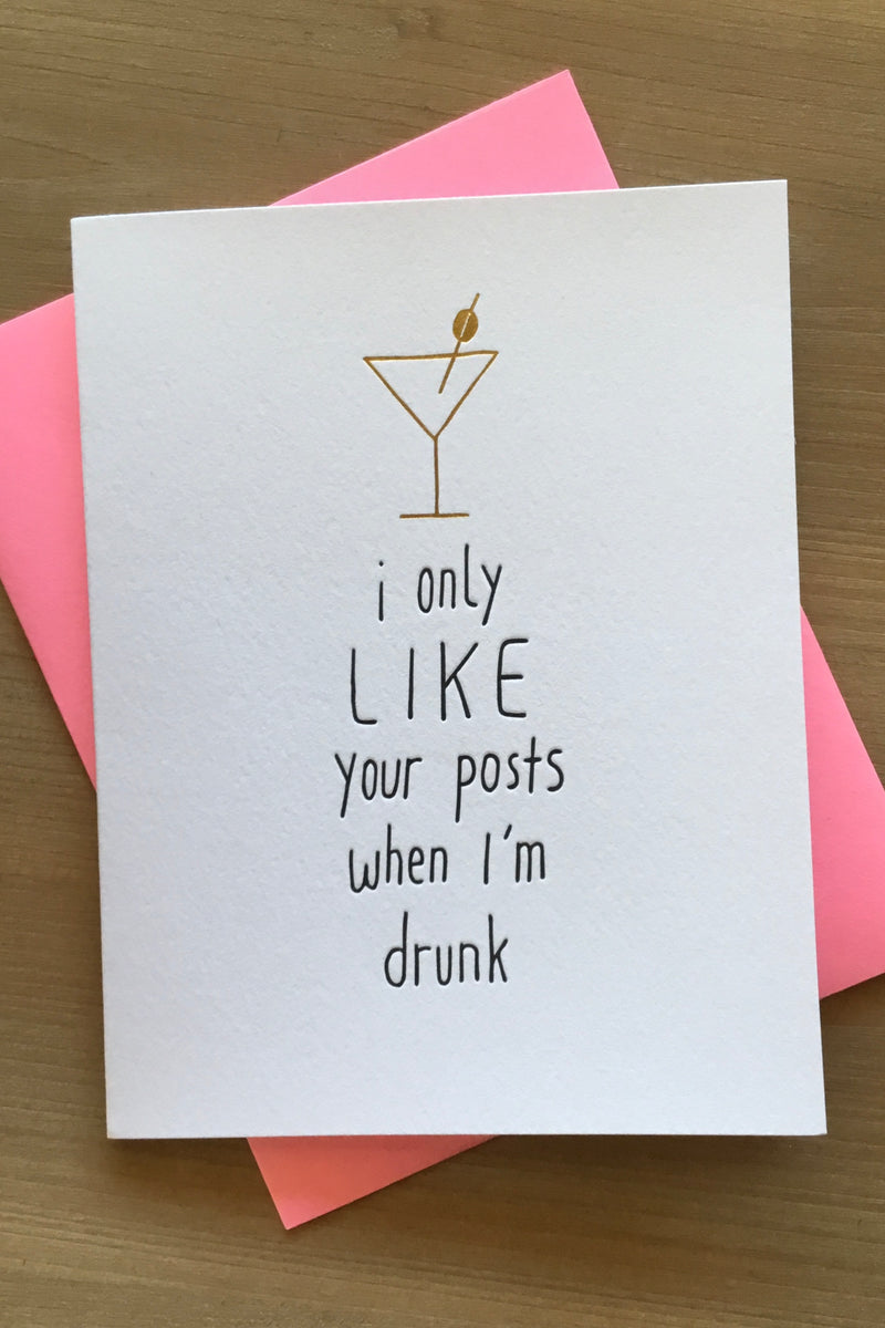 A white card with the words “I only like your post when I’m drunk.“ and an image of a martini glass.