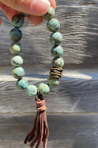 Round Bead Leather Tassel Bracelet