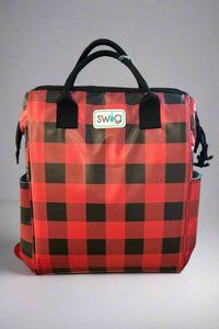 A soft cooler with zipper closure and two side pockets in traditional buffalo plaid.