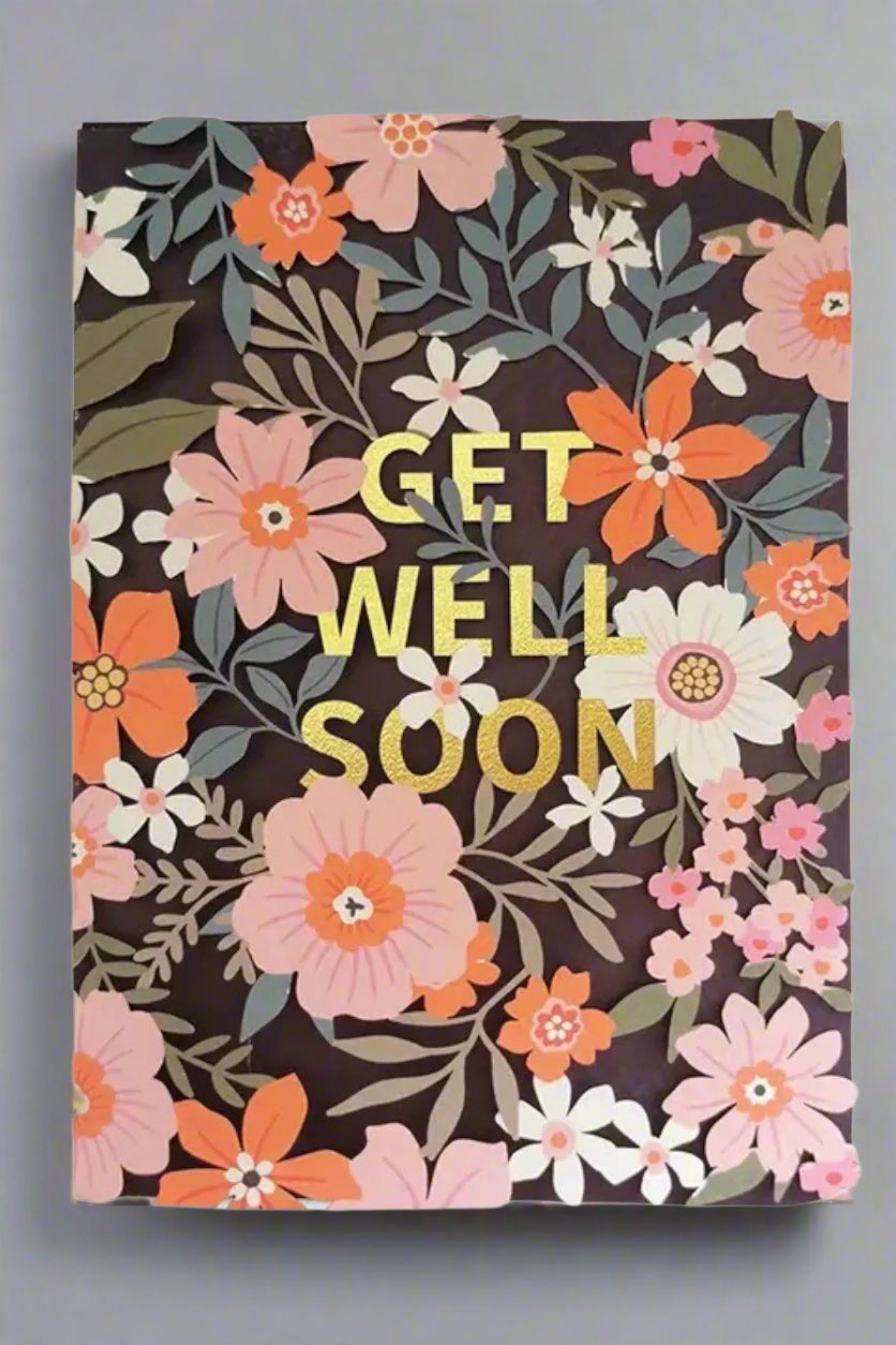 A floral pattern card with the words “Get Well Soon.”