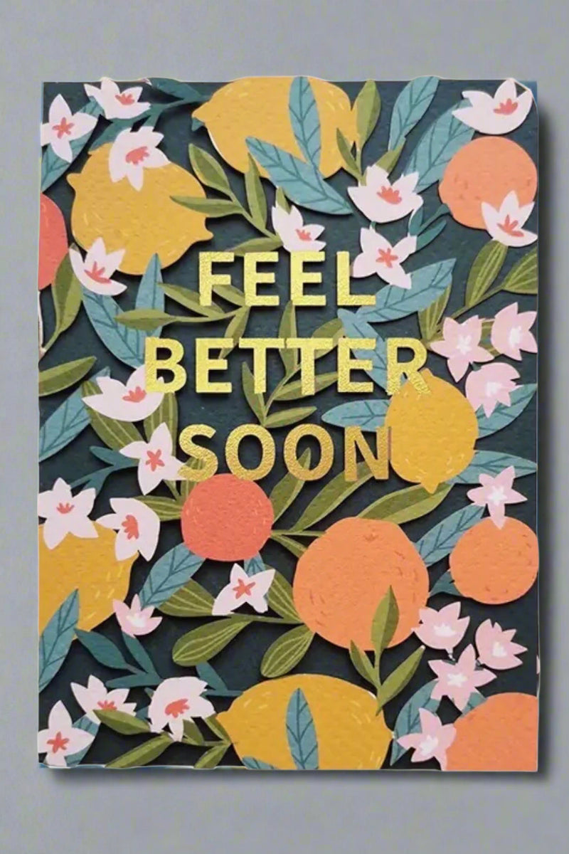 A colorful botanical card that says “feel better soon” in cold.