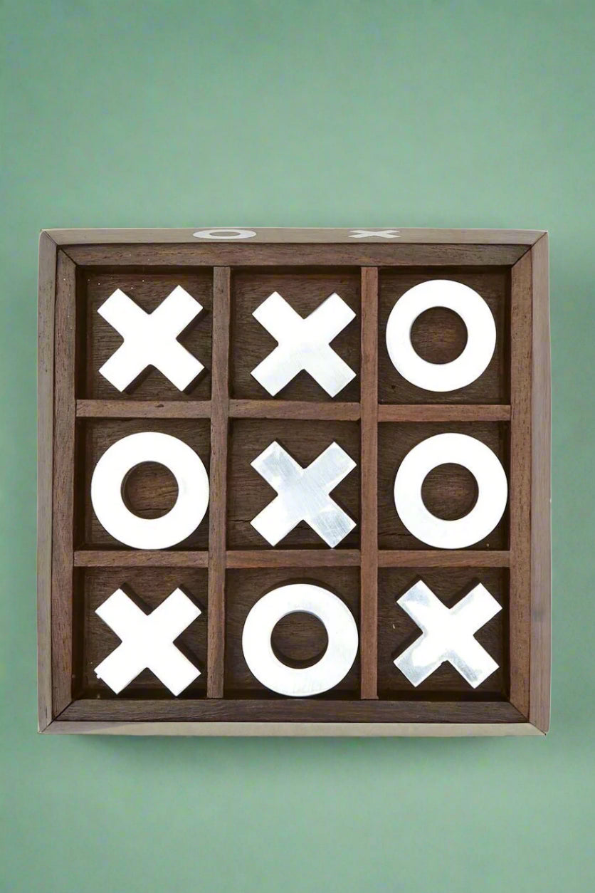 An image of a large wood tic tack toe board.