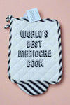 Matching oven mitt and pot holder that reads ‘World’s best mediocre cook.’