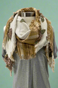 Triangle, winter scarf featuring mustard plaid on one side and burgundy roses with a cream background on the other side.